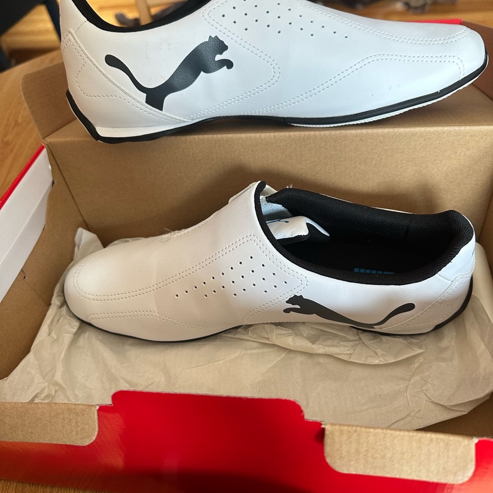 New unused Puma White and Black Minimalist Sneakers